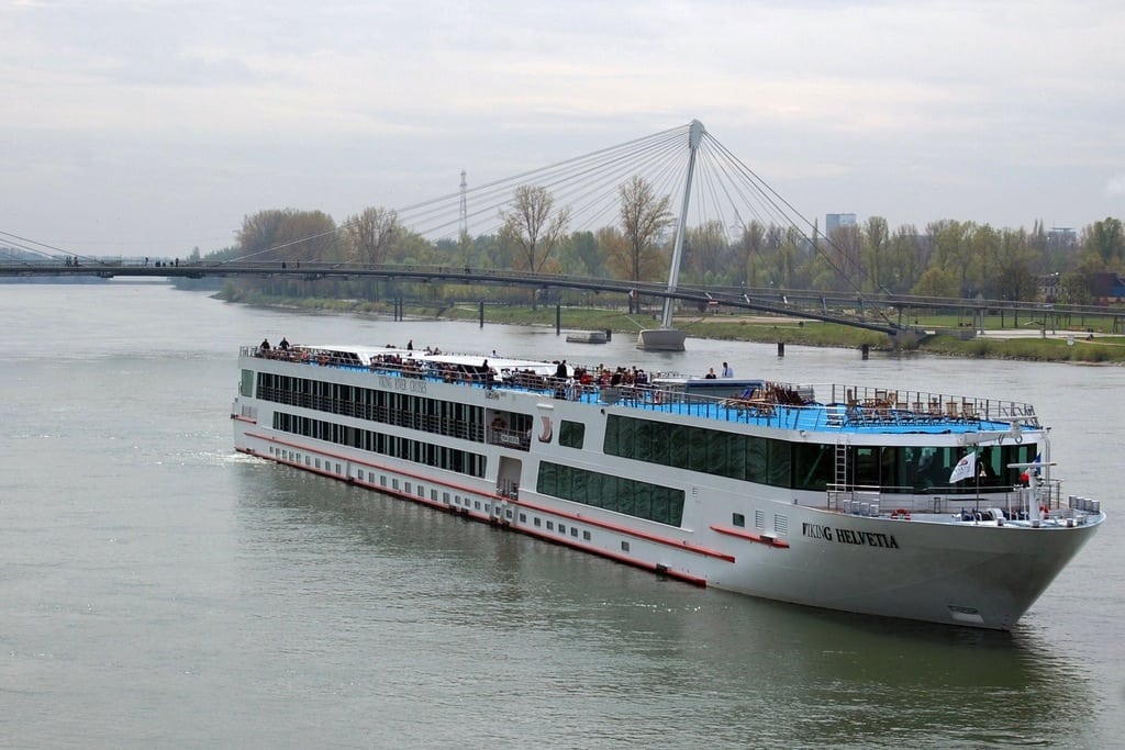 The Viking Helvetia River cruise ship crosses the Rhine River between Germany and France.  