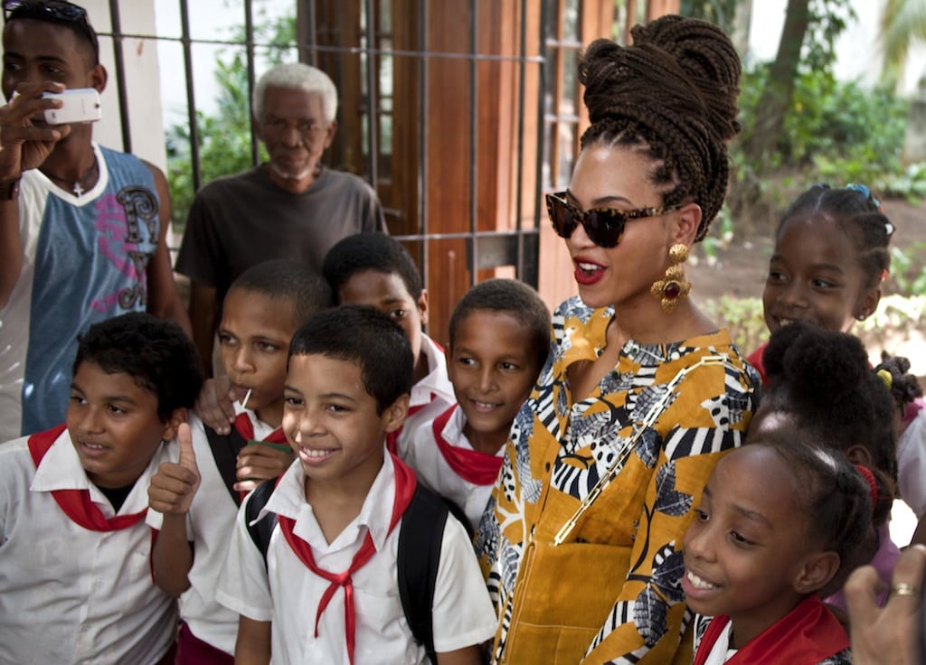 Beyonce poses with school kids in Old Havana April 4. 