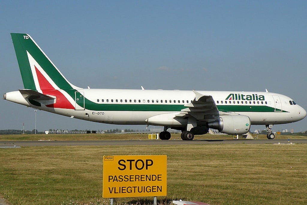 Alitalia sits on the runway at Amsterdam's Shipol Airport. 