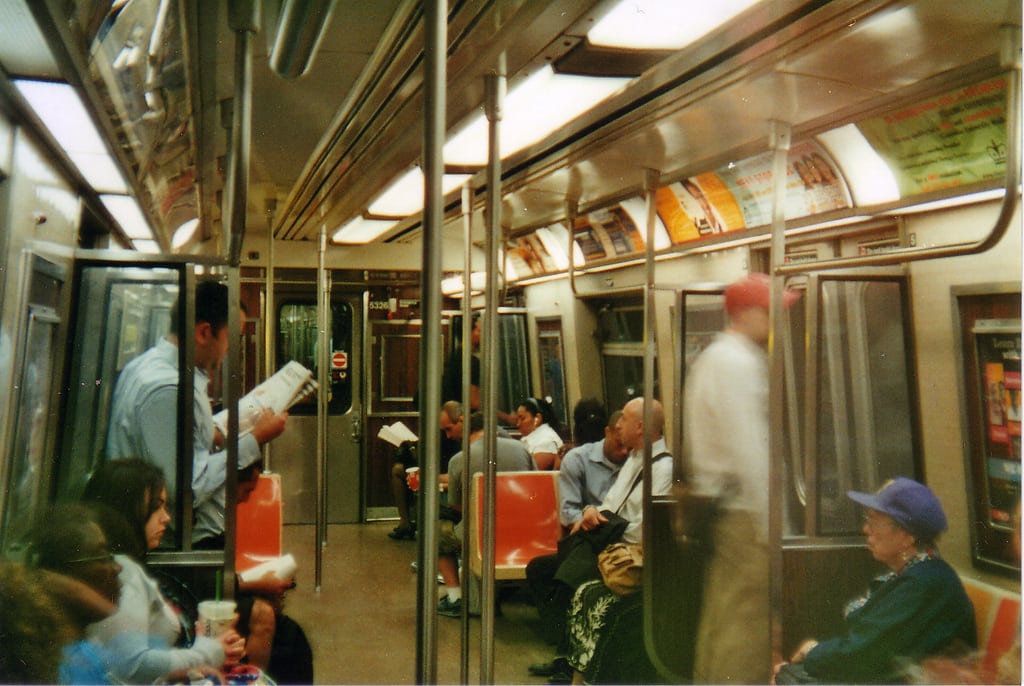 Scene inside a New York City subway car. 