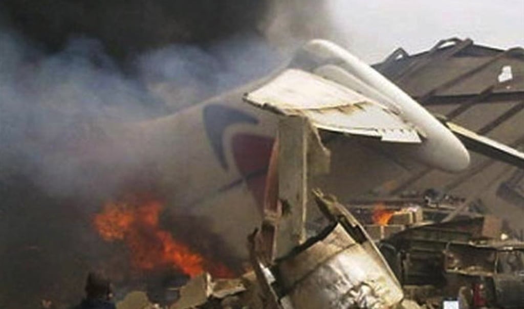 The wreckage of a Dana Air MD-83 plane burns in Nigeria's commercial capital Lagos, June 3, 2012.  