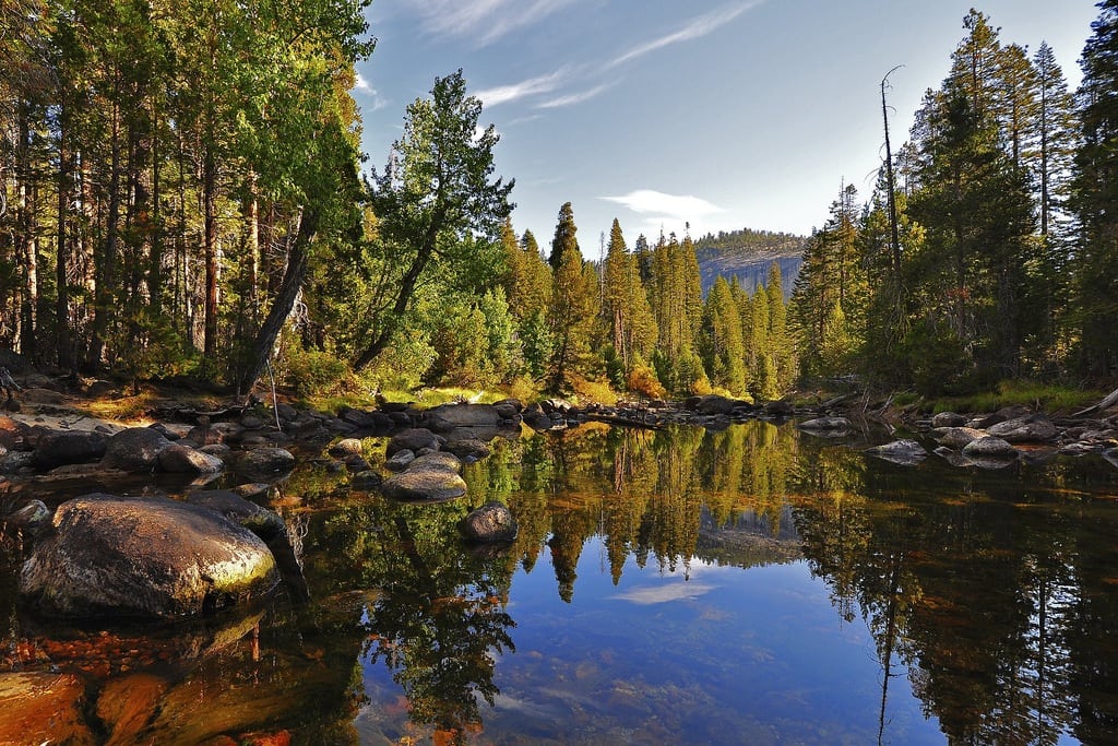 Restoring the natural flow of the Merced River in Yosemite National Park would mean some bike rental kiosks and an ice-skating rink would have to be scrapped. 