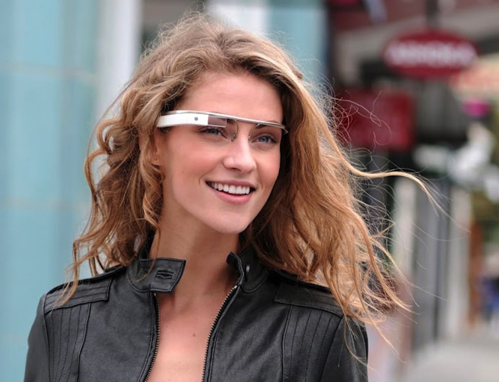 Project Glass", an early prototype of Google's futuristic Internet-connected glasses, are modeled. The specs are said to give you directions, let you video chat, shop and do everything else you now need a handheld gadget to accomplish.  