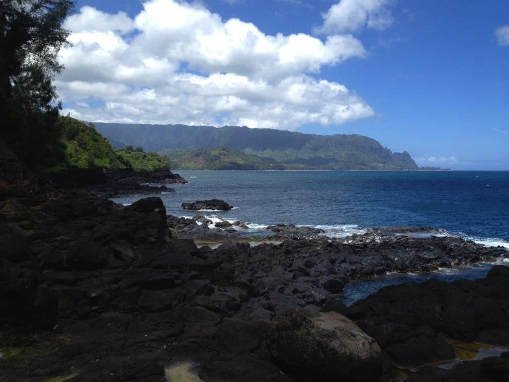 This Aug. 4, 2012 photo shows Queen's Bath on the island of Kauai is pictured in Princeville, Hawaii. Kauai Visitors Bureau Executive Director Sue Kanoho cautions that on any given day, the weather can changes and lead to deaths here by drowning.  