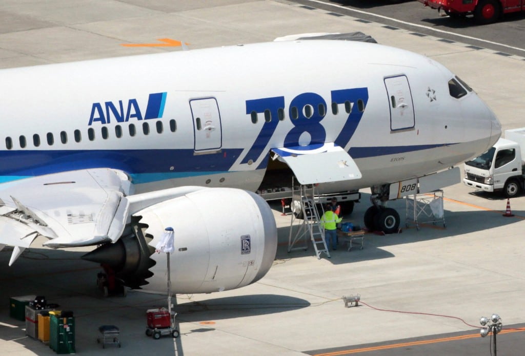 An ANA's Boeing Co's 787 Dreamliner plane receives restoration work at Okayama airport in Okayama, Japan. 