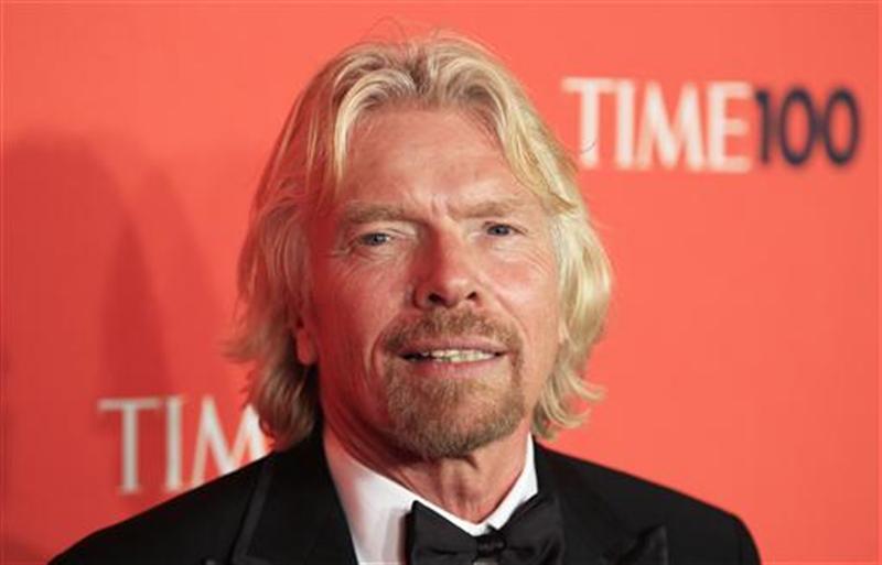 Entrepreneur Richard Branson arrives as a guest for "Time Magazine's 100 Miost Influential People in the World" gala in New York