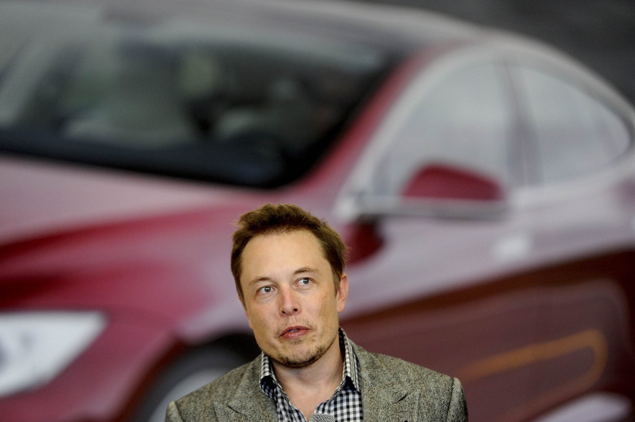 Tesla Chief Executive Office Elon Musk speaks at his company's factory in Fremont. 