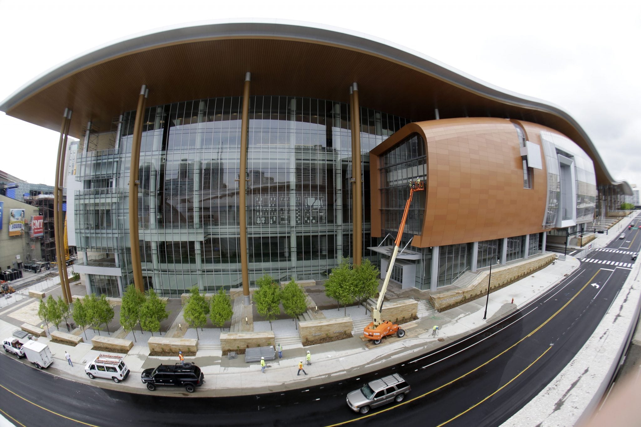 This April 29, 2013, photo made with a fisheye lens shows the Music City Center in Nashville, Tenn. Nashville's new convention center is transforming the look of downtown with its wavy roof dominating six city blocks, but tourism officials hope the eye-catching facility will also show business travelers a revitalized Music City. 