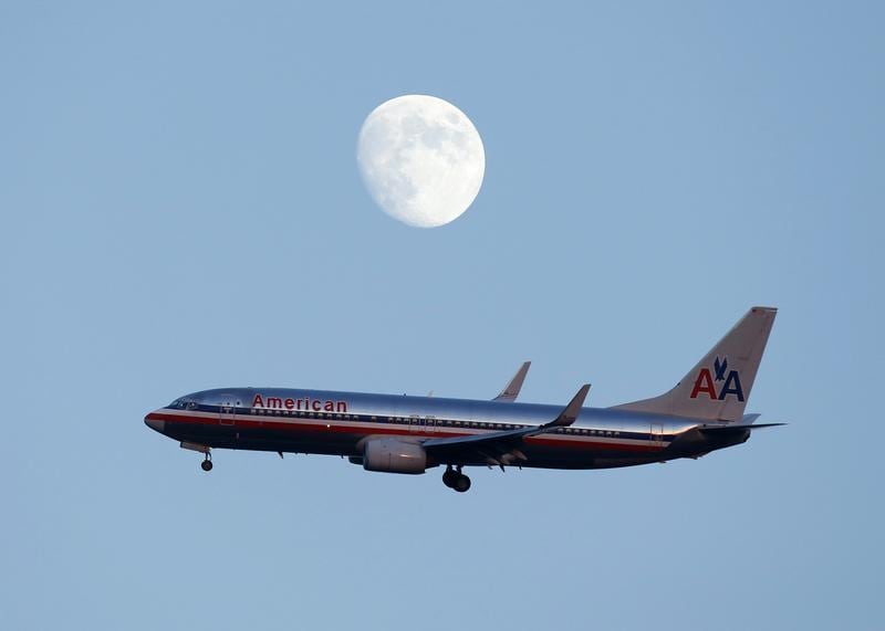 An American Airlines passenger jet comes in the land at LaGuardia airport in New York. 