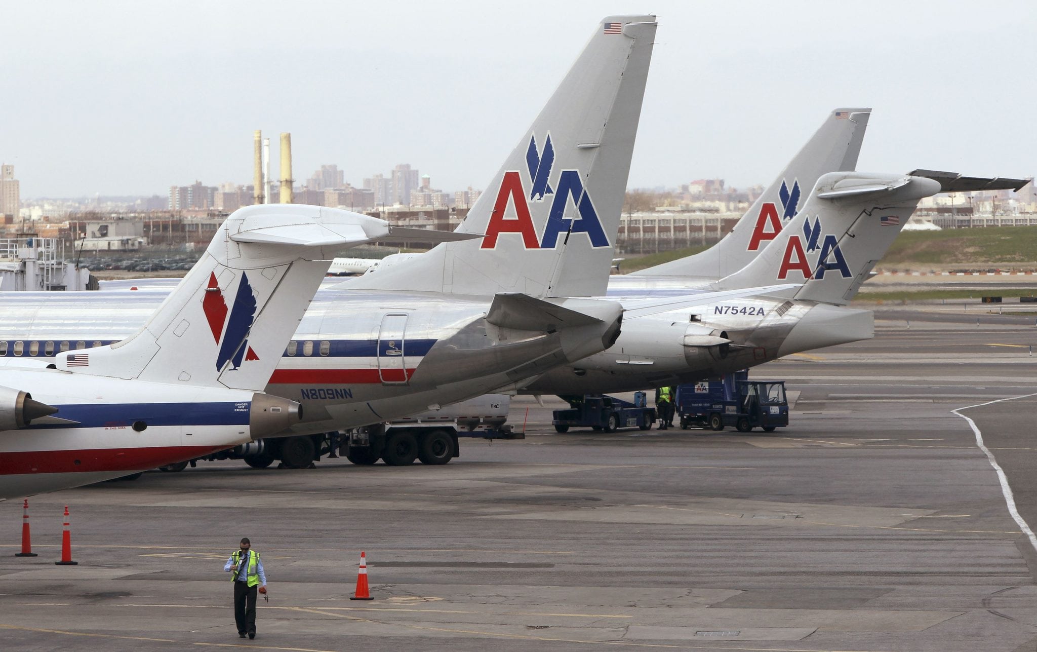 American Airlines aircraft sit on the tarmac at LaGuardia airport following a reservation system outage in New York. 