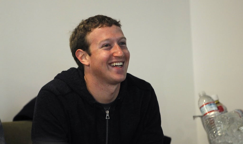 Facebook CEO Mark Zuckerberg has a lot to smile about, incliuding his travel budget.  This photo was taken after addressing the audience during a media event at Facebook headquarters in Menlo Park, California, March 7, 2013. 
