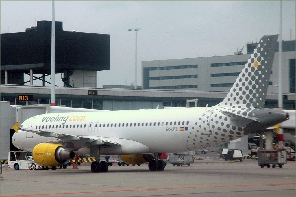 A Vueling jet pulls away from the gate at Amsterdam's Schipol Airport. 