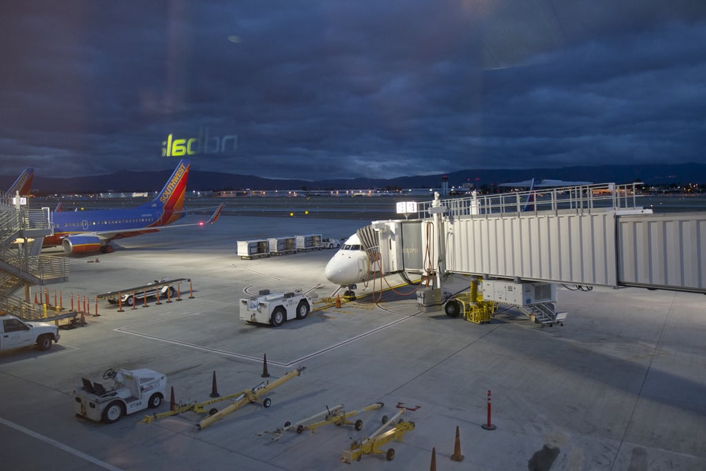 Southwest and Delta flights sit at the gates at the San Jose International Airport. 