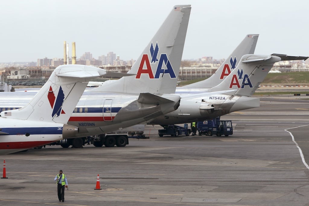 American Airlines aircraft sit on the tarmac at LaGuardia airport following a reservation system outage in New York, April 16, 2013. 