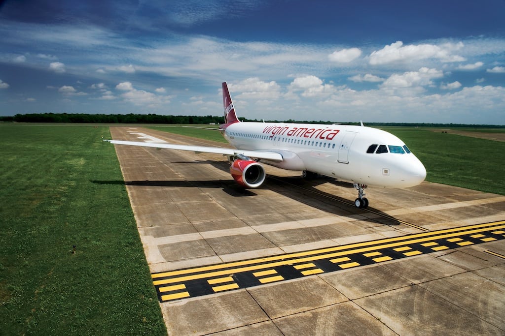 A Virgin America jet on the runway. 
