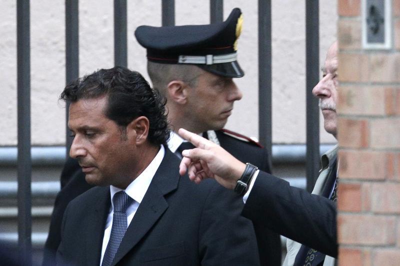 The captain of the Costa Concordia Francesco Schettino leaves at the end of the preliminary hearings in Grosseto. 