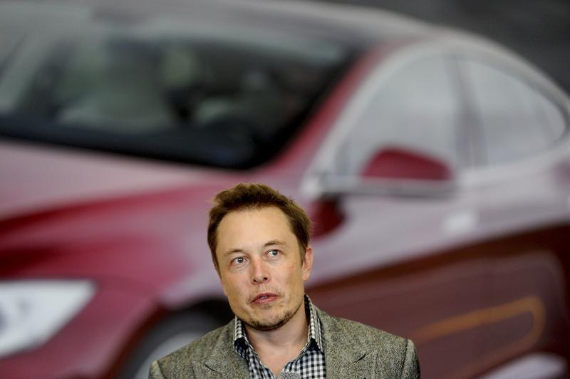 Elon Musk speaking at a Tesla factory in Fremont. 