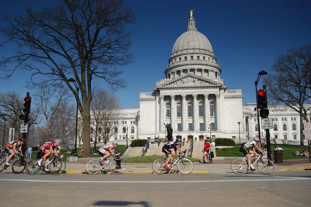 A bike race passes by Capitol Square in Madison, WIsconsin. 