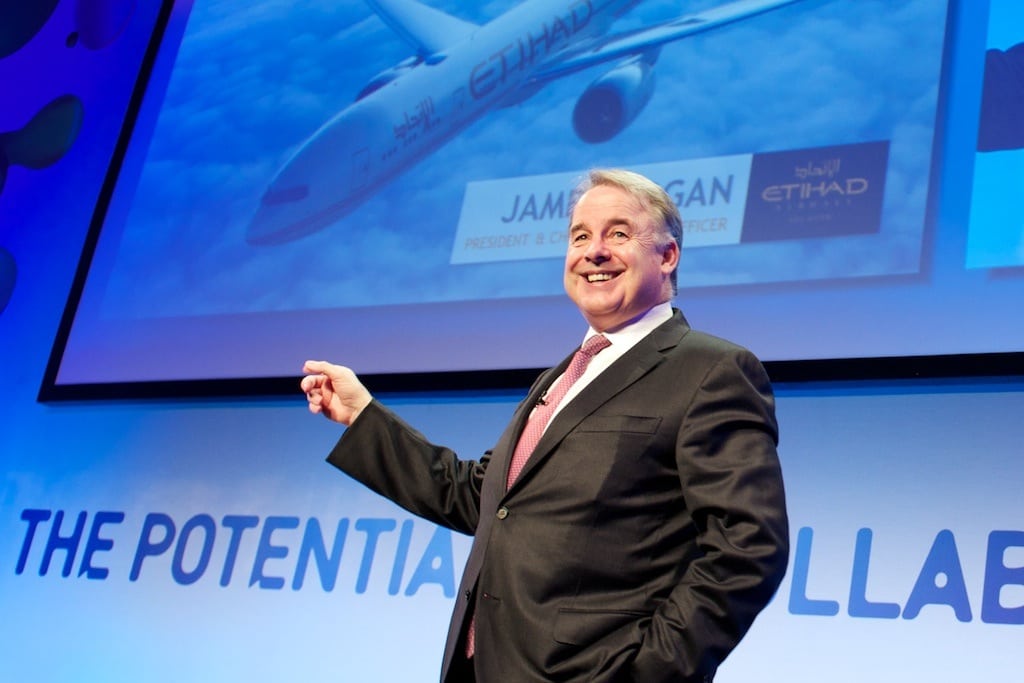 James Hogan, Etihad's CEO, at the SITA 2013 Air Transport IT Summit near Brussels June 20, pointing to the airline's strategy as a key differentiator from its airline rivals. 