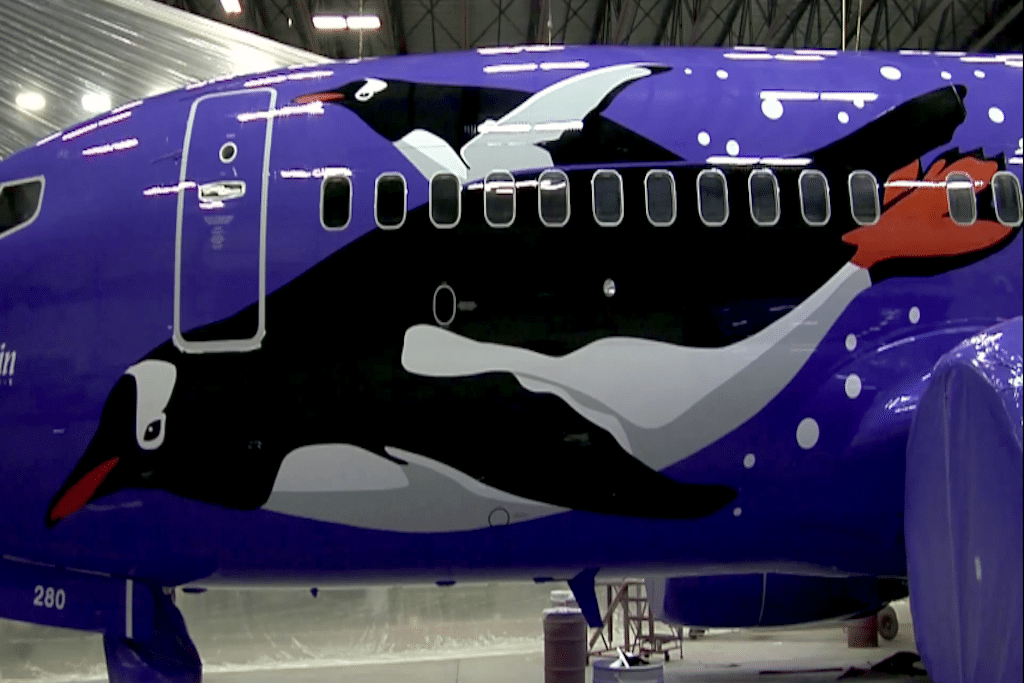Southwest unveils its new penguin livery in celebration of a 25-year partnership with SeaWorld. 