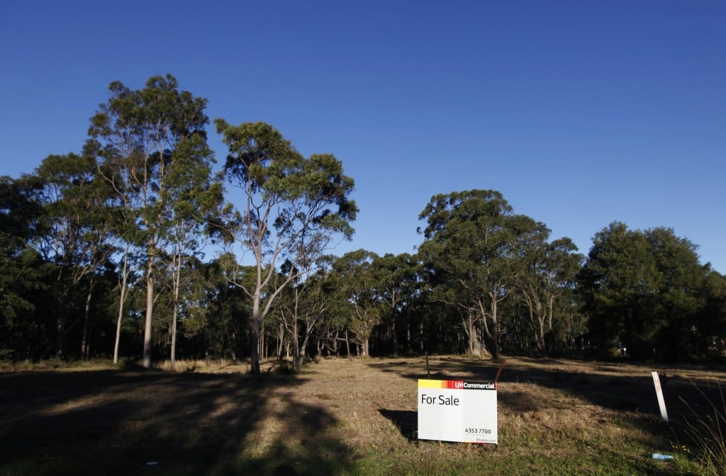 A 'for sale' sign is seen on the land where a a full-size replica of Beijing's Forbidden City will be built, in the Wyong region near Sydney June 16, 2013.