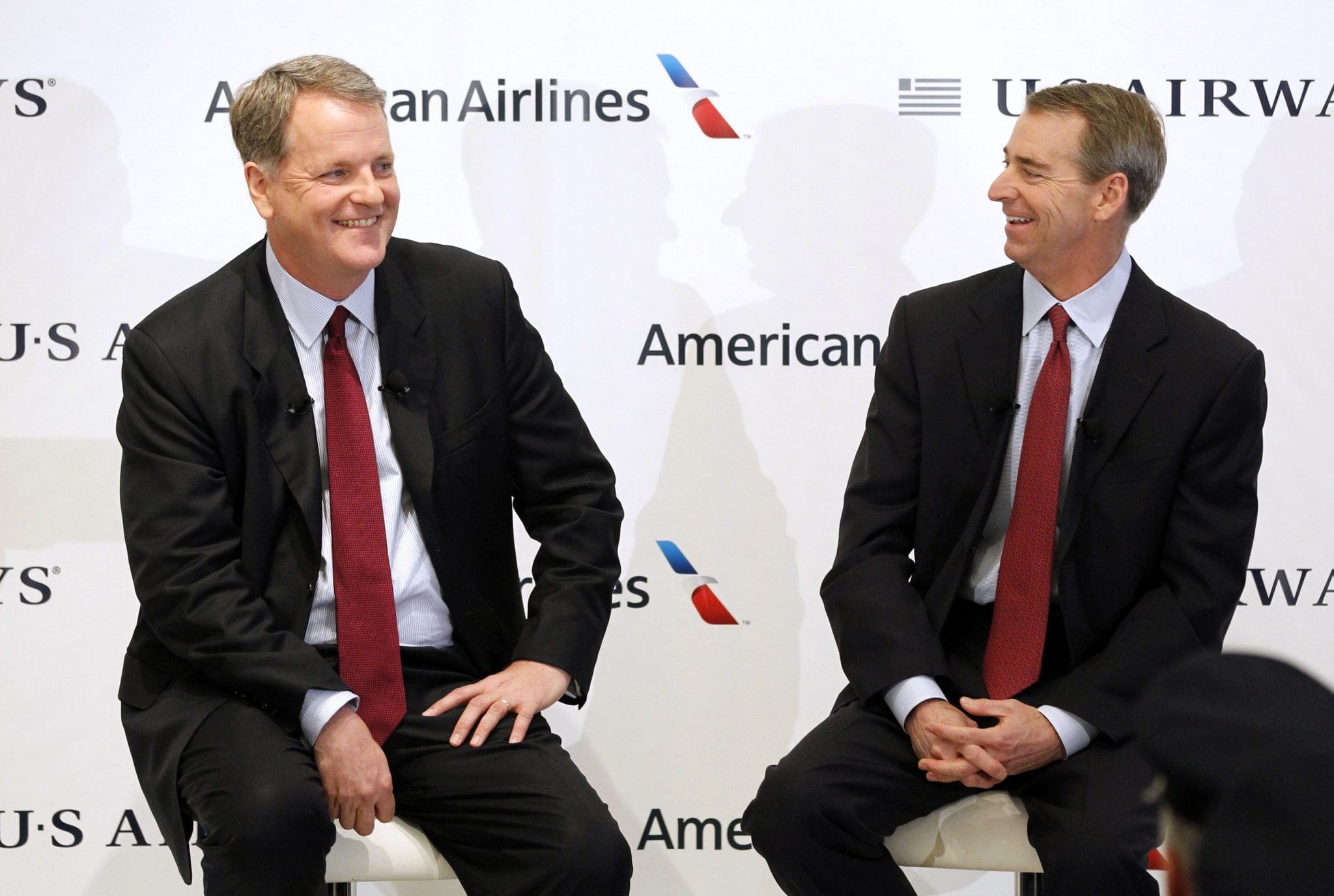 US Airways CEO Parker and American Airlines Chairman, President and CEO Horton announce the planned merger of American Airlines and US Airways during a news conference at Dallas-Ft Worth International Airport. 