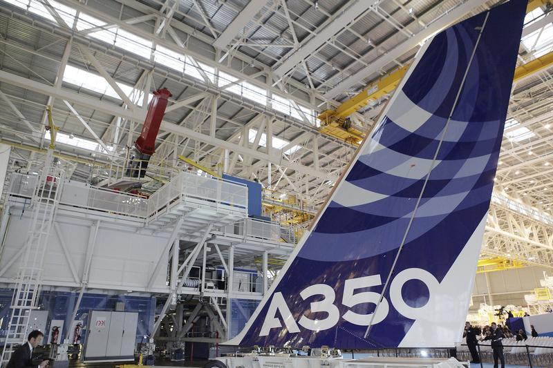 The vertical tail wing of the first Airbus A350 is seen on the final assembly line in Toulouse. 