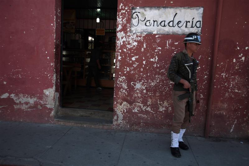 A soldier stands guard outside Santo Domingo Hotel, the venue of an anti-drugs summit, in Antigua. 
