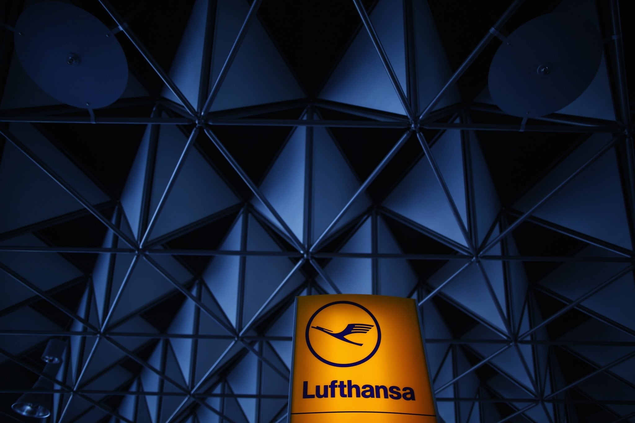 The logo of German air carrier Lufthansa is pictured at Fraport airport in Frankfurt. 
