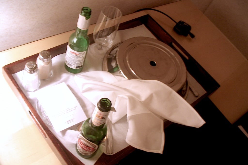 A typical end to a room-service Club Sandwich. 