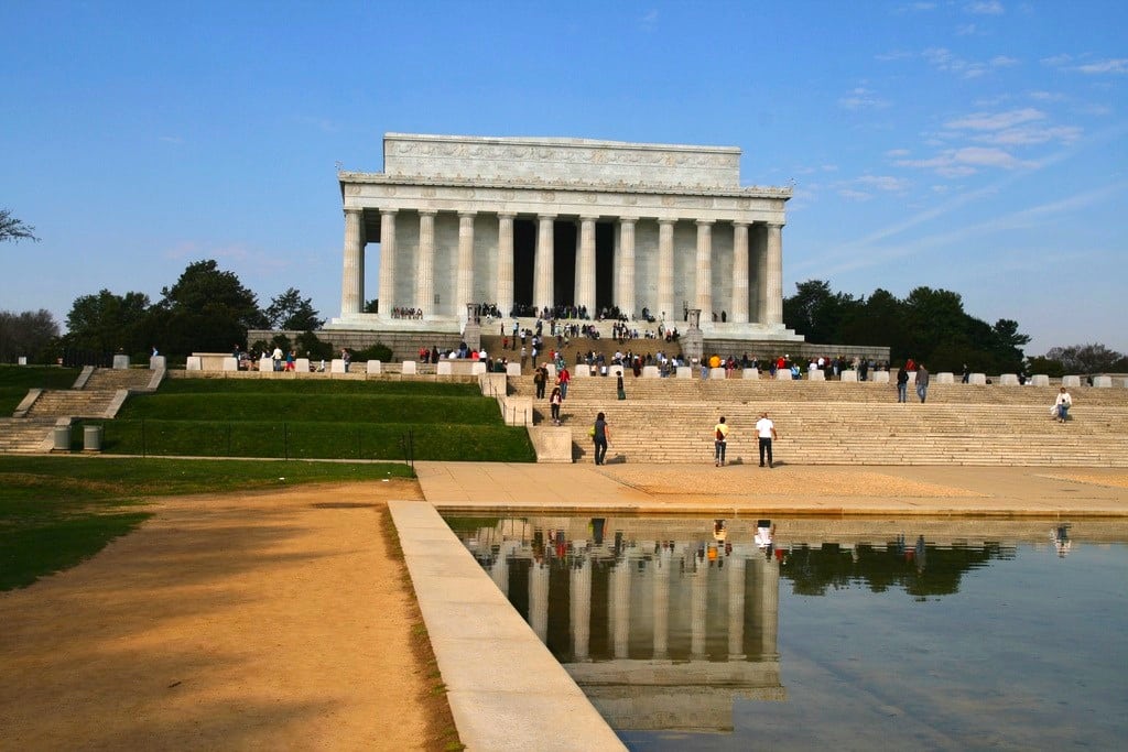 Tourists walk around the Lincoln Memorial in Washington, D.C. 