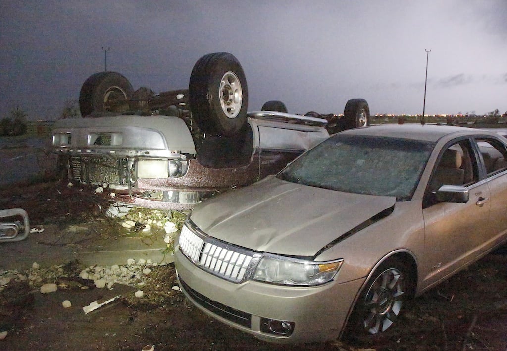  Cars that were damaged by a tornado in parking lot at Canadian Valley Technical Center on State Highway 66, west of Banner Road, Friday May 31, 2013 in El Reno, Oklahoma