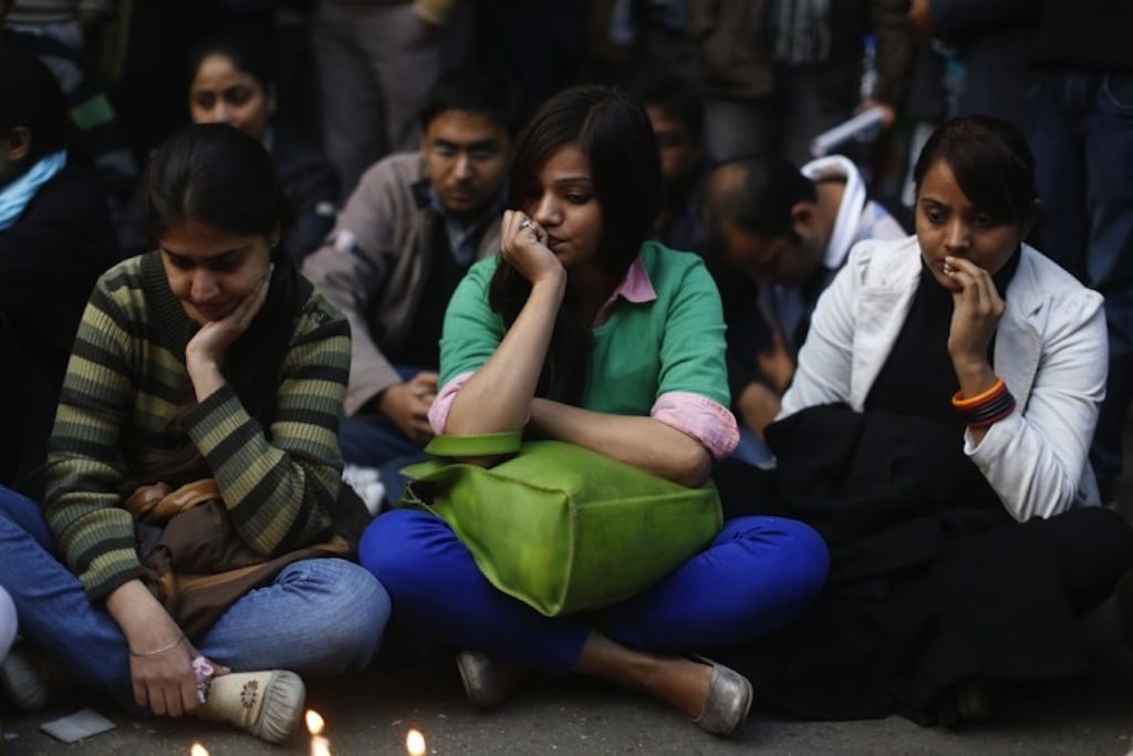 Demonstrators take part in a protest for a gang rape victim who was assaulted in New Delhi December 29, 2012. 