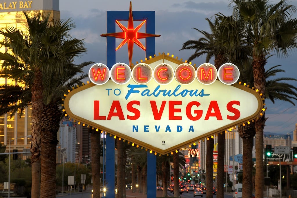 The famous neon sign welcomes millions of visitors to Las Vegas each year.
