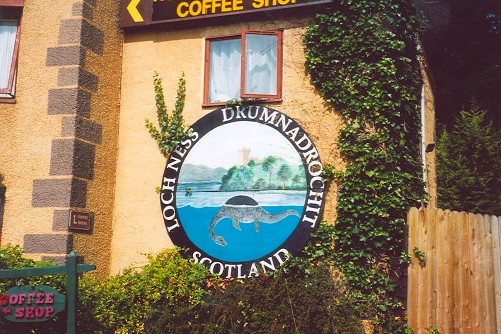 The sign of the Loch Ness Monster Visitor Centre in Drumnadrochit, Scotland. 