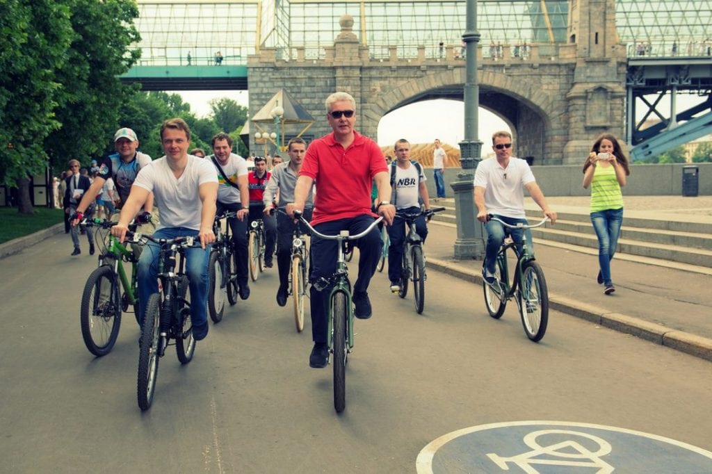 Deputy Mayor of Moscow, head of the Department for Transport and Road Infrastructure Development Maxim Liksutov, Moscow Mayor Sergei Sobyanin, riding the bikes at the launch.