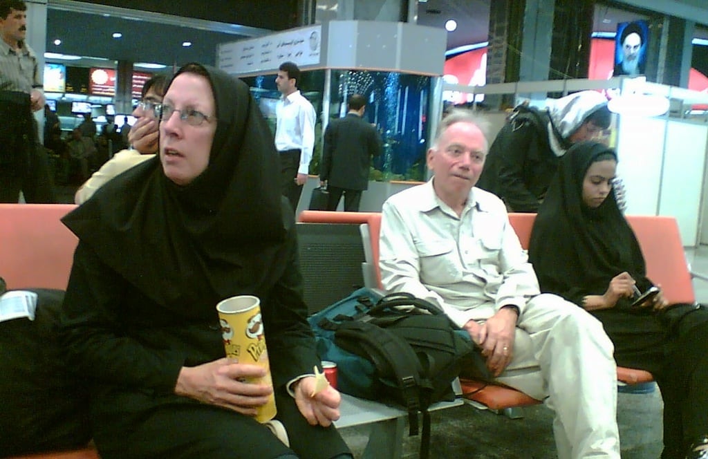 People sitting at Tehran Imam Khomeini International Airport in 2007. Kayak recently ceased offering searches for flights to Tehran, but they will resume shortly. 