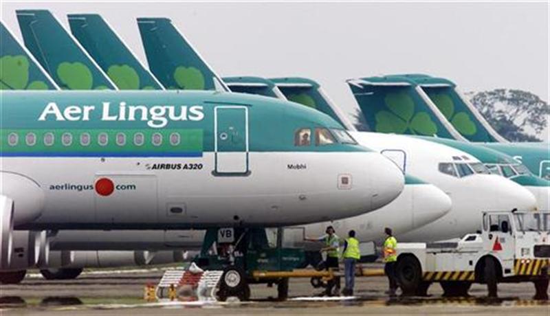 File photograph shows ground crew parking an Aer Lingus aircraft at Dublin Airport in the Republic of Ireland. 