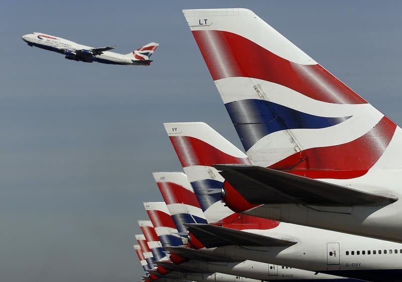 A British Airways jet takes off from Heathrow. The airline wants to wet-lease nine planes from Qatar to cover flying during a proposed strike by flight attendants. 