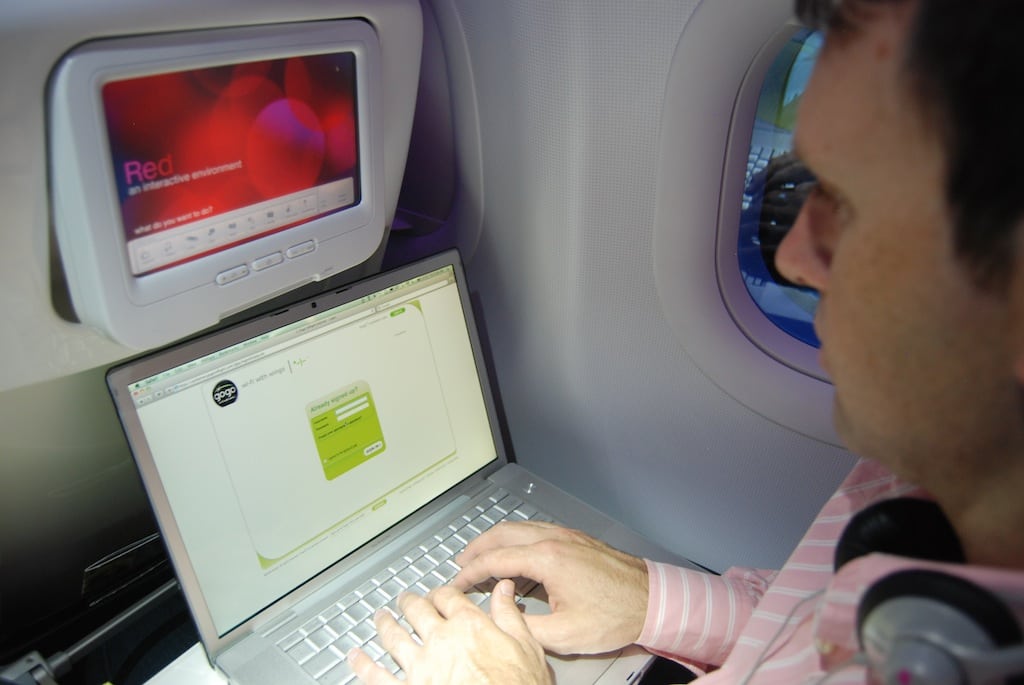 A passenger on a Virgin America plane fires up his onboard Wi-Fi.