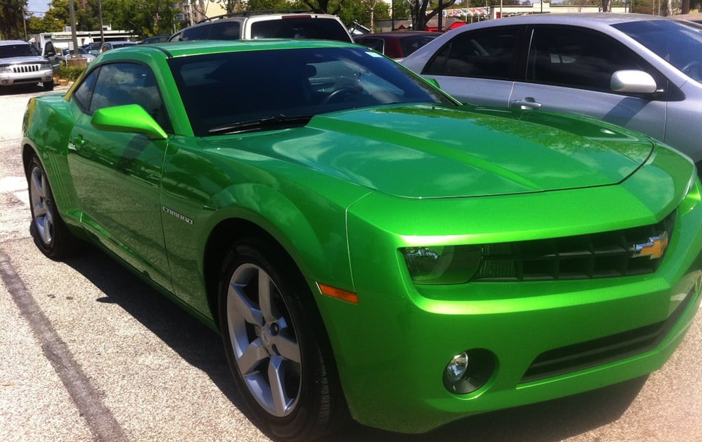 Rentalcars.com offers customers virtually all major brands, including Hertz and its Mustangs for rent. Like the hue of the Hertz rental in the photo, Rentalcars.com is seeing green.