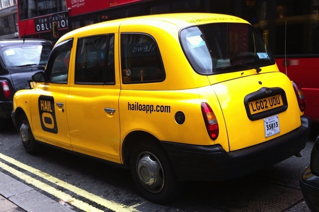 A taxi painted in Hailo colors in London. 