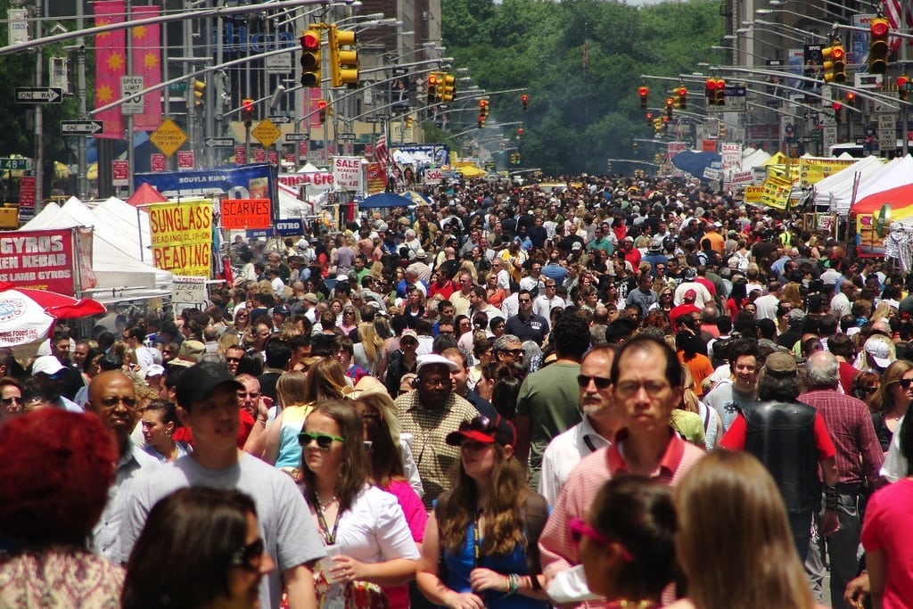 New York City's Sixth Avenue is taken over by pedestrians for the International Street Fair. 