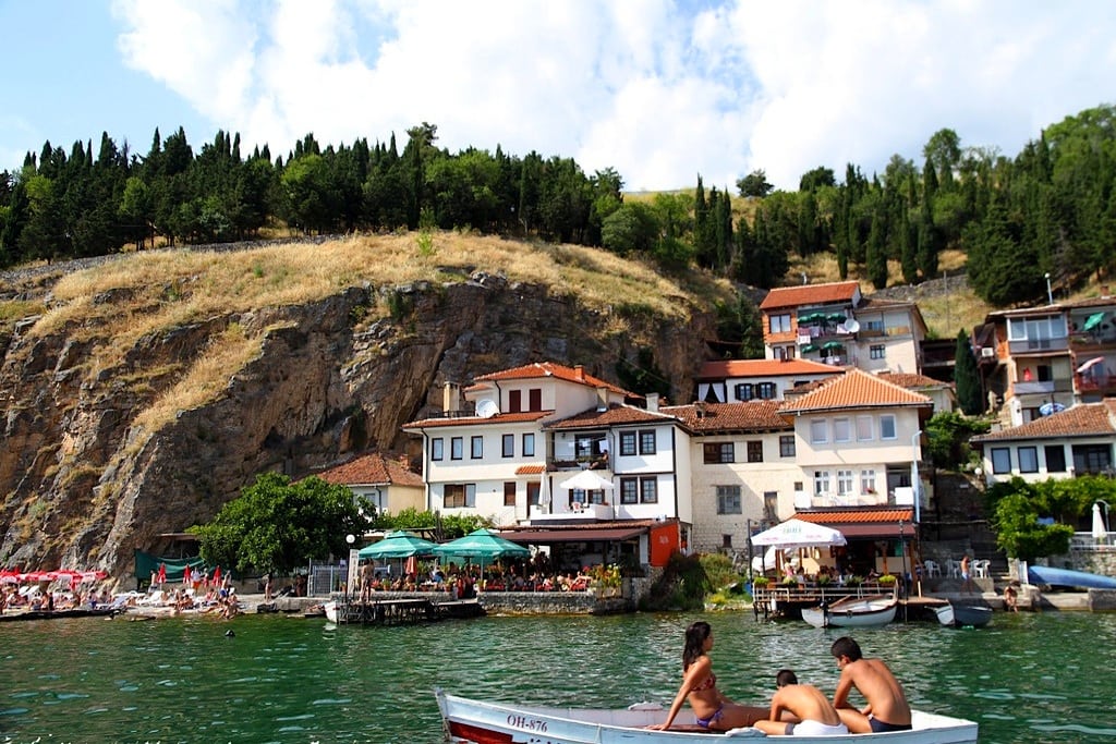 Teens relax on a small boat on Lake Ohrid in Macedonia.