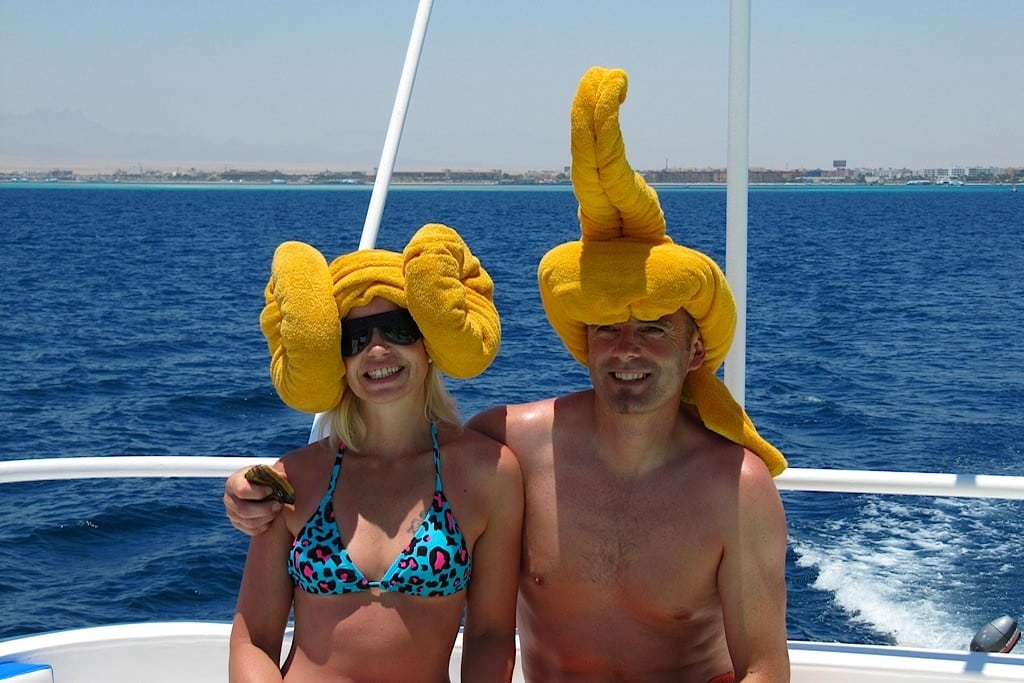 A couple wears towel art on their heads in Egypt. 