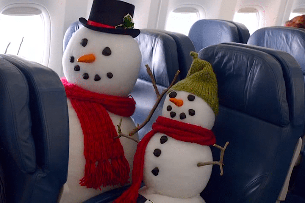 A troupe of holiday characters stay in Delta's new safety in-flight video. 