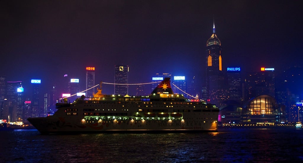 A Star Cruise ship floats through Victoria Harbor in Hong Kong. 