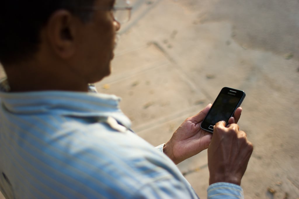 Using a smartphone in Bangalore, India. 