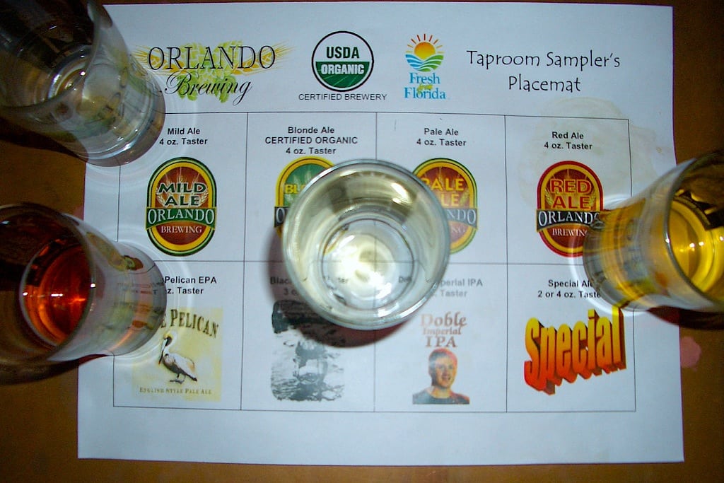 A sampler placemat is dotted with beer glasses at Orlando Brewing.