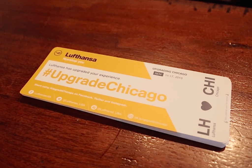 A Lufthansa flight attendant is handing out upgrades, from free coffees to limo rides, throughout Chicago to promote the introduce of new Business Class seats on the Chicago - Frankfurt route. 